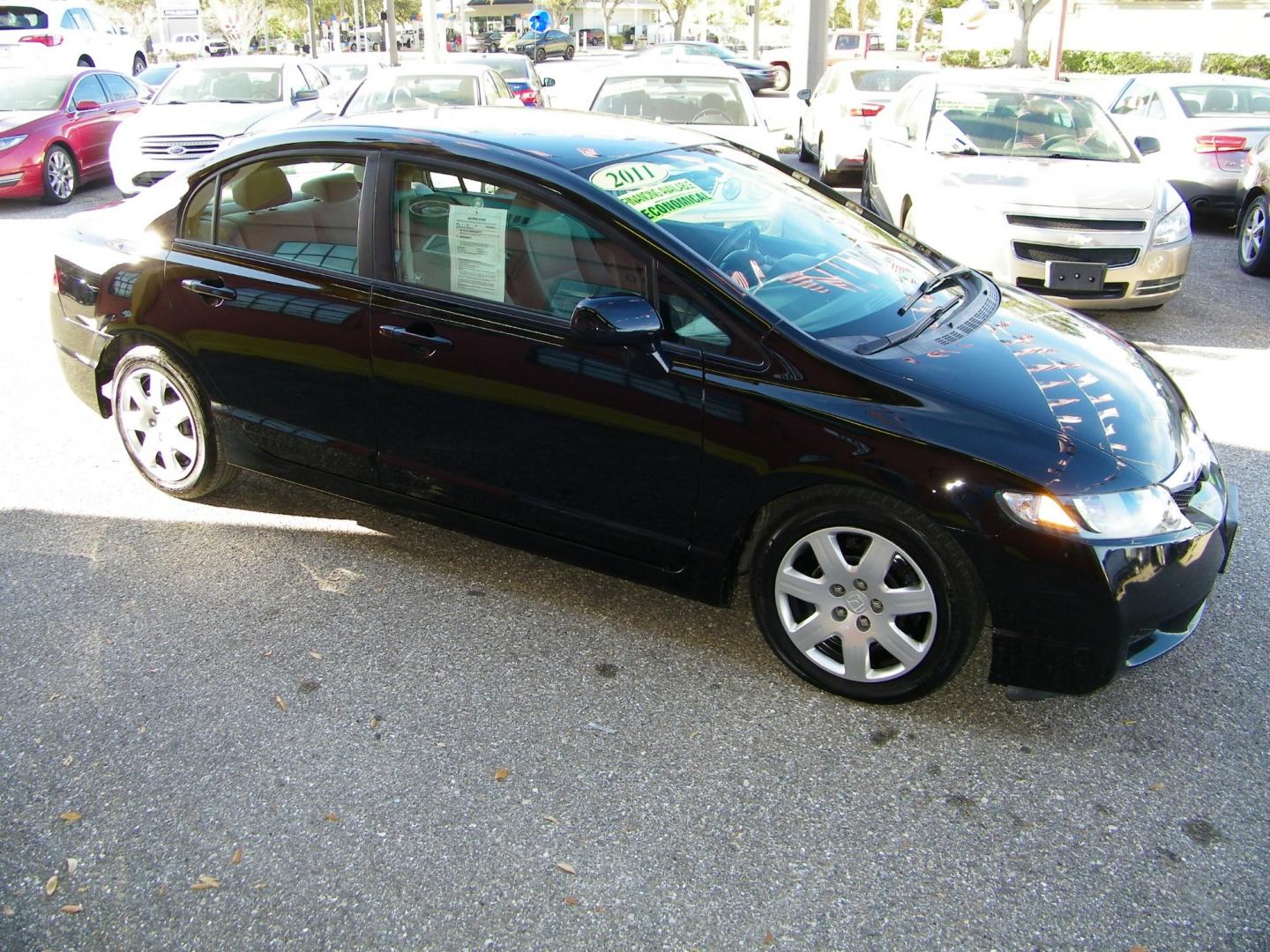 2011 Black /Gray Honda Civic LX Sedan 5-Speed AT (19XFA1F5XBE) with an 1.8L L4 SOHC 16V engine, 5-Speed Automatic transmission, located at 4000 Bee Ridge Road, Sarasota, FL, 34233, (941) 926-0300, 27.298664, -82.489151 - Photo#9